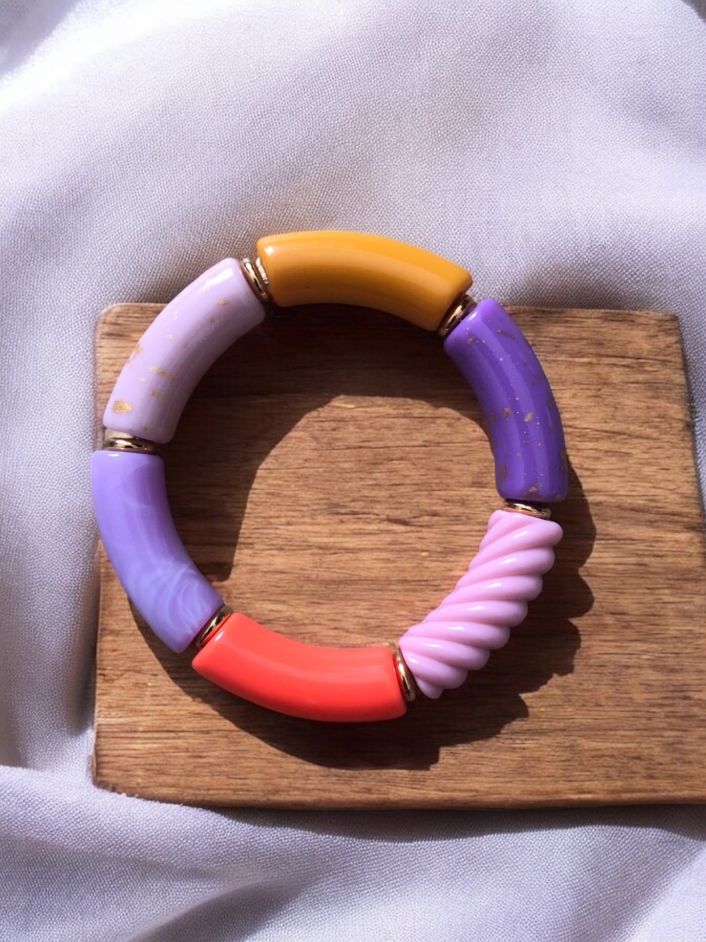 Bracelet tube ton violet jaune orange